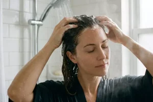 1672122775-woman-washing-hair-in-shower-1